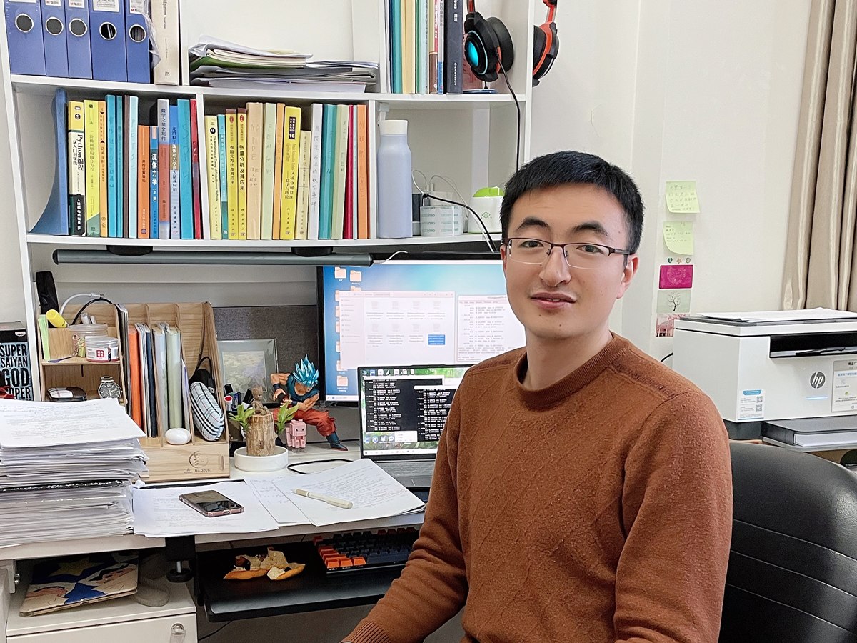 Yizhong Sun in his office
